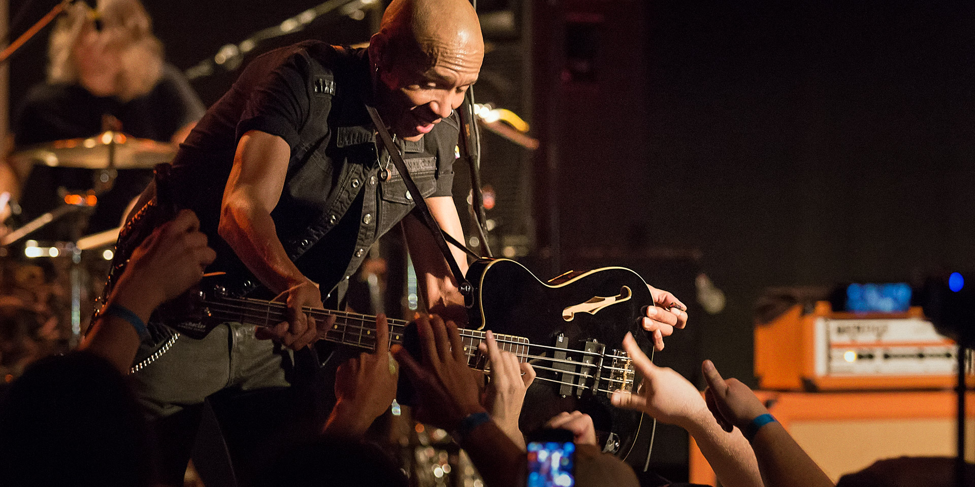 King's X: Crowd helps bassist Dug Pinnick play bass